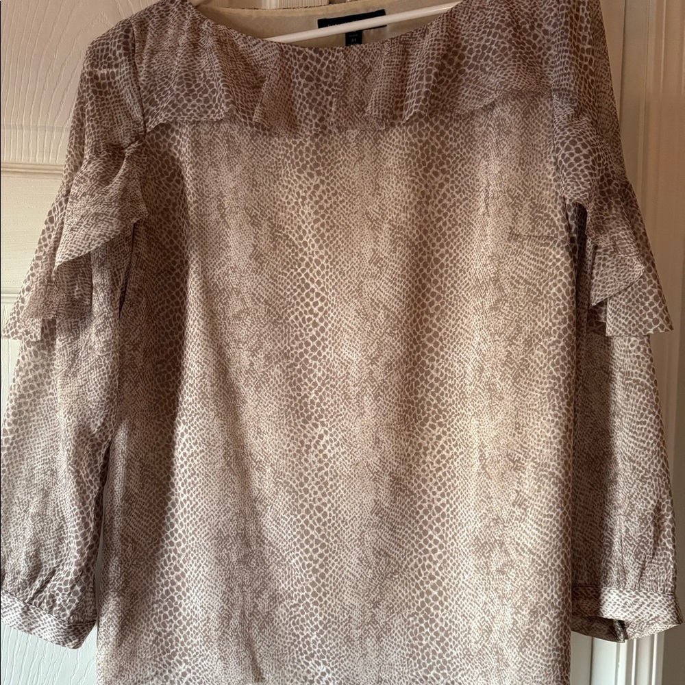 Banana Republic blouse. petite medium. Ruffles on sleeves and across top.